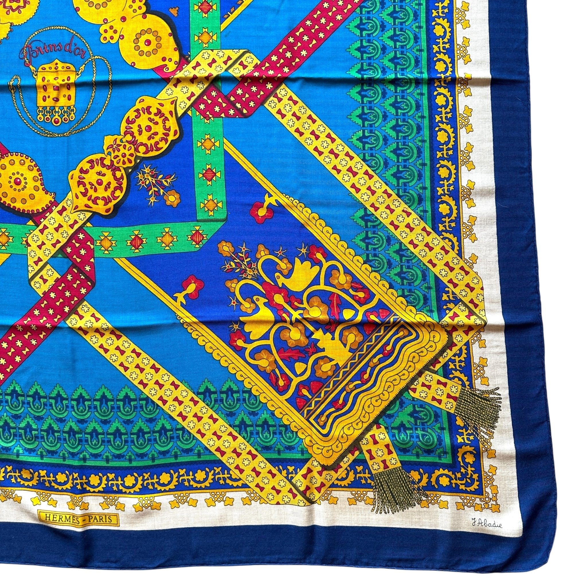 signature dans le coin du foulard